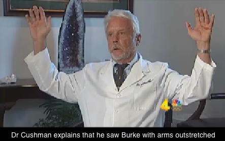 Dr Cushman, arms raised